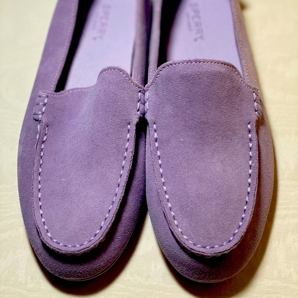 Lilac colored Sperry driving shoes.